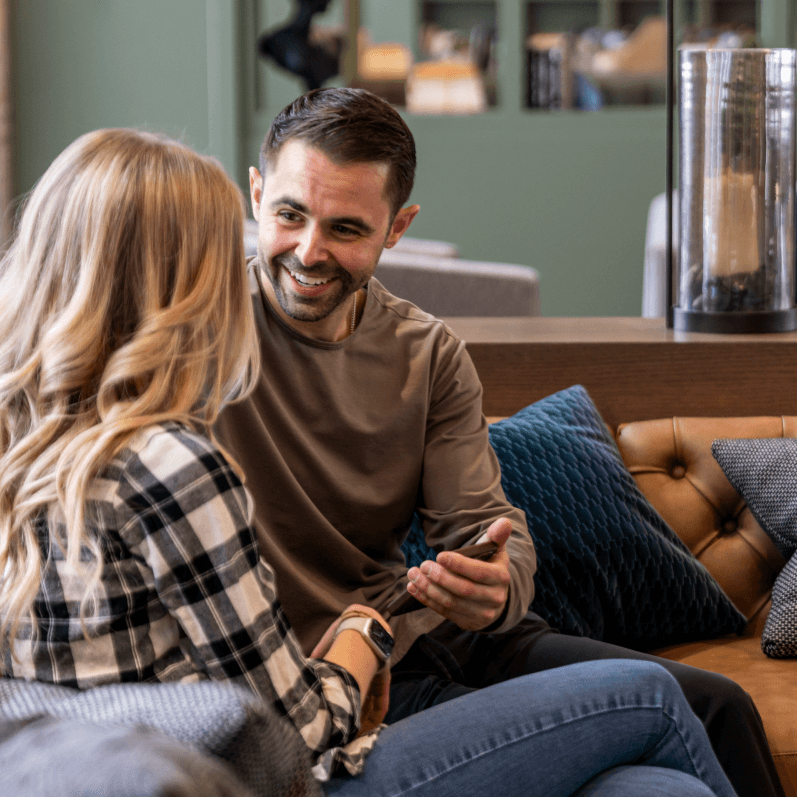 A couple reviewing their MYLO move details together