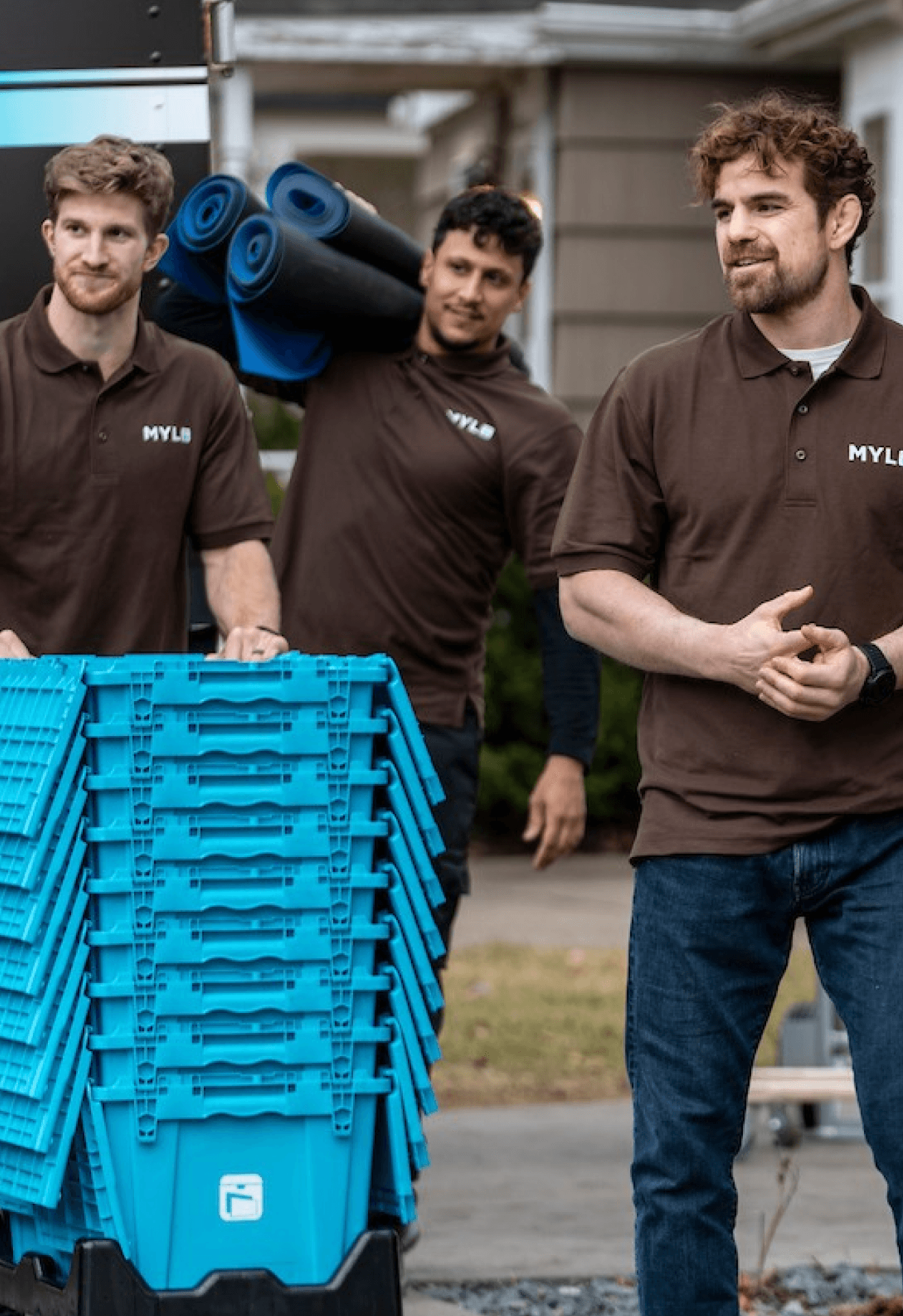 A MYLO truck and professional moving crew